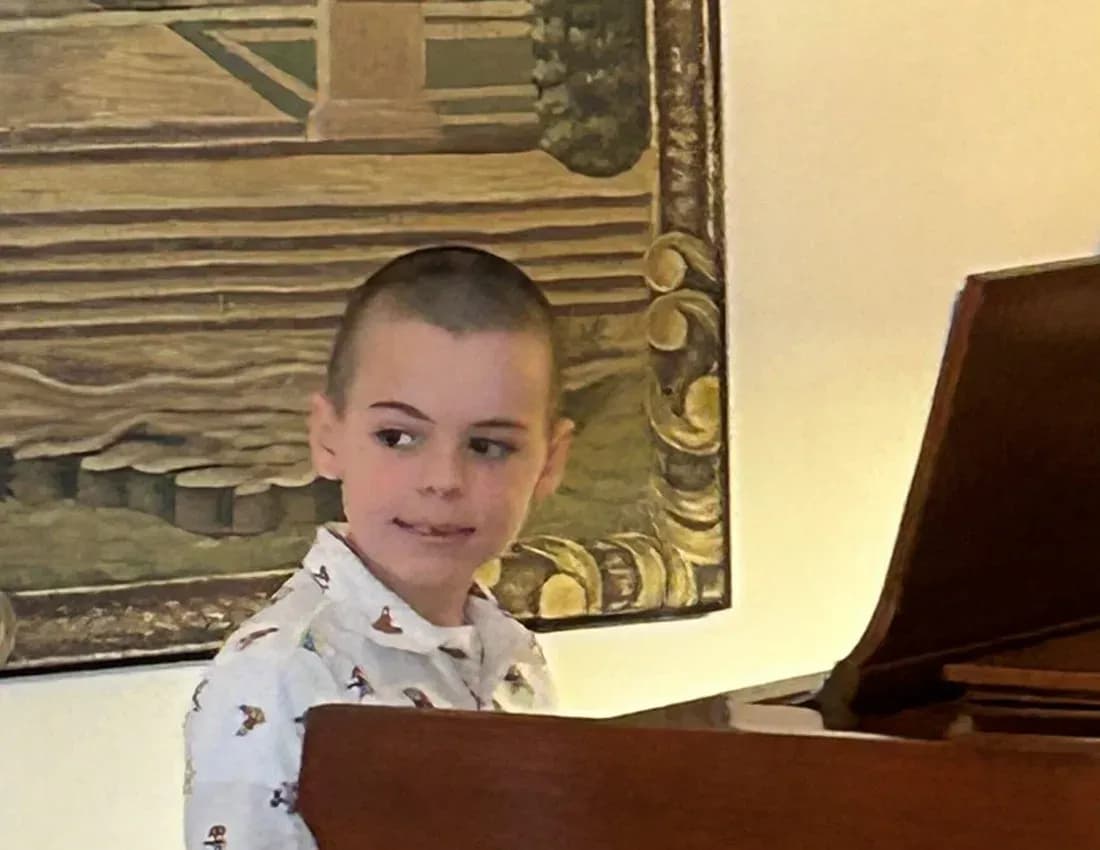 A young KSA pianist performing at a recital